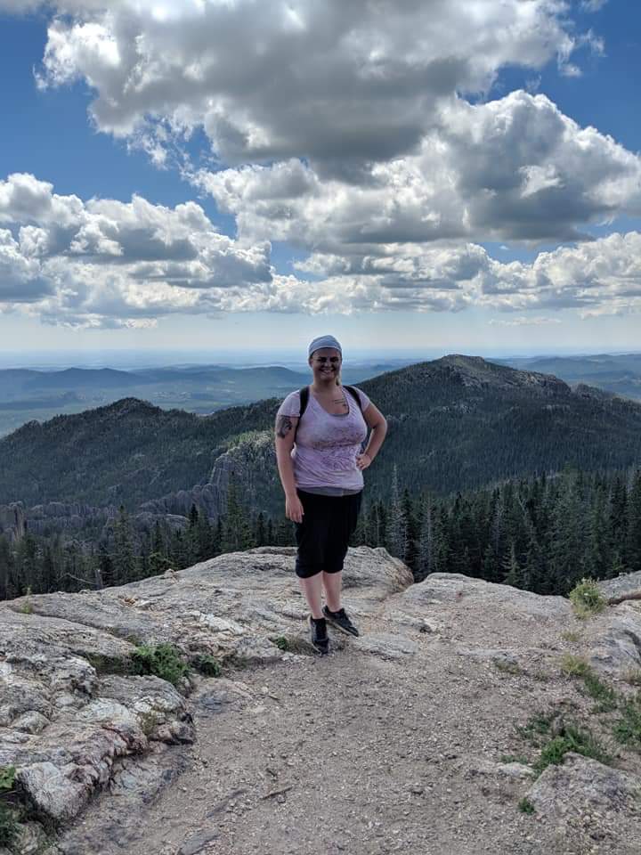 Avery Catherwood at the top of Black Elk Peak in South Dakota.